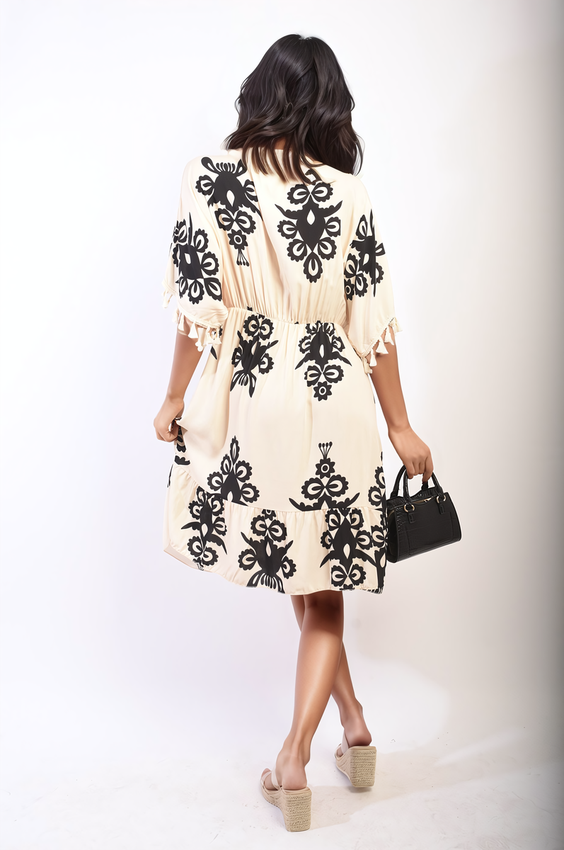 Printed V-Neck Short Sleeve Midi Dress with Tassel Detail Printed V-Neck Short Sleeve Midi Dress with Tassel Detail