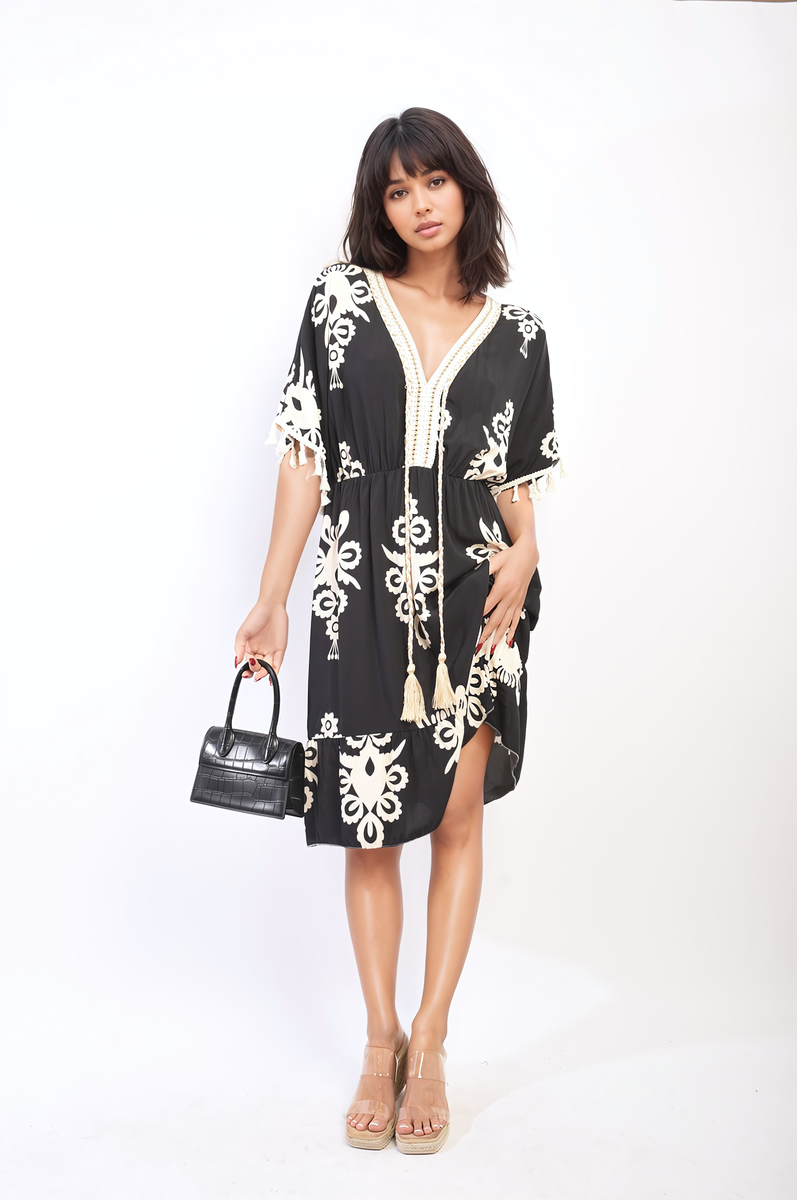 Printed V-Neck Short Sleeve Midi Dress with Tassel Detail Printed V-Neck Short Sleeve Midi Dress with Tassel Detail