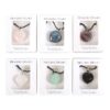 Set of 24 Healing Heart Crystal Necklaces in Display