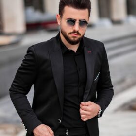 man in black suit jacket and black sunglasses