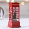 Christmas Phone Booth Light Table For The Elderly Decorated With Christmas Tree