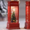 Christmas Phone Booth Light Table For The Elderly Decorated With Christmas Tree