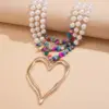 Elegant Heart Pendant Choker Necklace – Multilayer Pearl Chain for Women