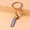 Alloy Metal Enamel Musical Keychain – Piano & Music Note Handbag Pendant Alloy Metal Enamel Musical Keychain – Piano & Music Note Handbag Pendant