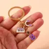 Alloy Metal Enamel Musical Keychain – Piano & Music Note Handbag Pendant Alloy Metal Enamel Musical Keychain – Piano & Music Note Handbag Pendant