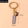 Alloy Metal Enamel Musical Keychain – Piano & Music Note Handbag Pendant Alloy Metal Enamel Musical Keychain – Piano & Music Note Handbag Pendant