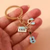 Alloy Metal Enamel Musical Keychain – Piano & Music Note Handbag Pendant Alloy Metal Enamel Musical Keychain – Piano & Music Note Handbag Pendant