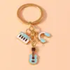 Alloy Metal Enamel Musical Keychain – Piano & Music Note Handbag Pendant Alloy Metal Enamel Musical Keychain – Piano & Music Note Handbag Pendant