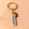 Alloy Metal Enamel Musical Keychain – Piano & Music Note Handbag Pendant Alloy Metal Enamel Musical Keychain – Piano & Music Note Handbag Pendant