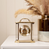 Gold Skeleton Mantel Clock with Handle and Visible Movement Gold Skeleton Mantel Clock with Handle and Visible Movement