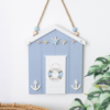 Blue Beach Hut Hanging Decoration with Life Ring – Coastal Wall Ornament